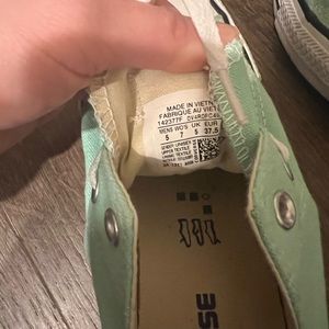 Converse shoes in mint green